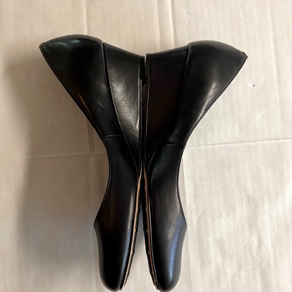 Cole Haan black leather wedge heel shoe in excellent condition.Size 7